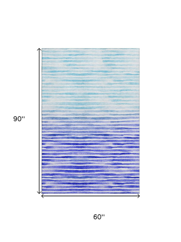 HomeRoots 5' Blue and Ivory Geometric Area Rug - Washable, UV-Protected, Stylish for High-Traffic Spaces! 645878