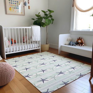 HomeRoots 9' X 12' Coastal Aqua Navy Blue Ivory Geometric Washable Area Rug with UV Protection & Durability 646126