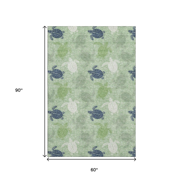 HomeRoots 5' X 8' Coastal Geometric Area Rug in Green, Ivory & Navy - Washable, UV-Protected, Stain-Resistant! 646159