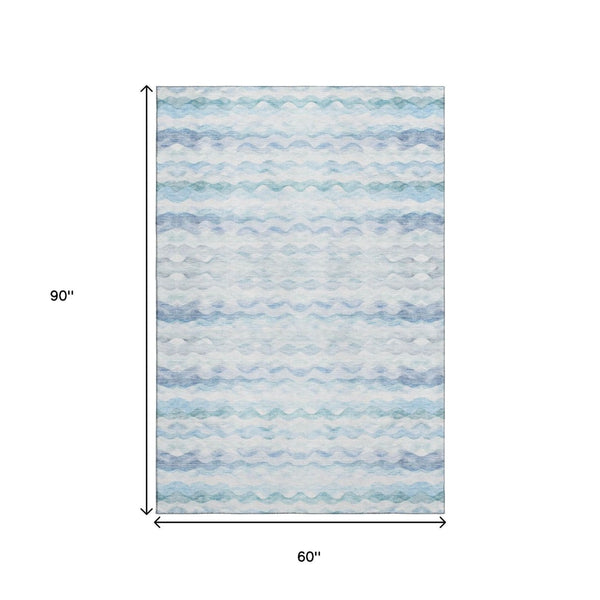 HomeRoots 5' X 8' Washable Blue and Ivory Geometric Area Rug with UV Protection for Stylish, Easy Care Living 646237