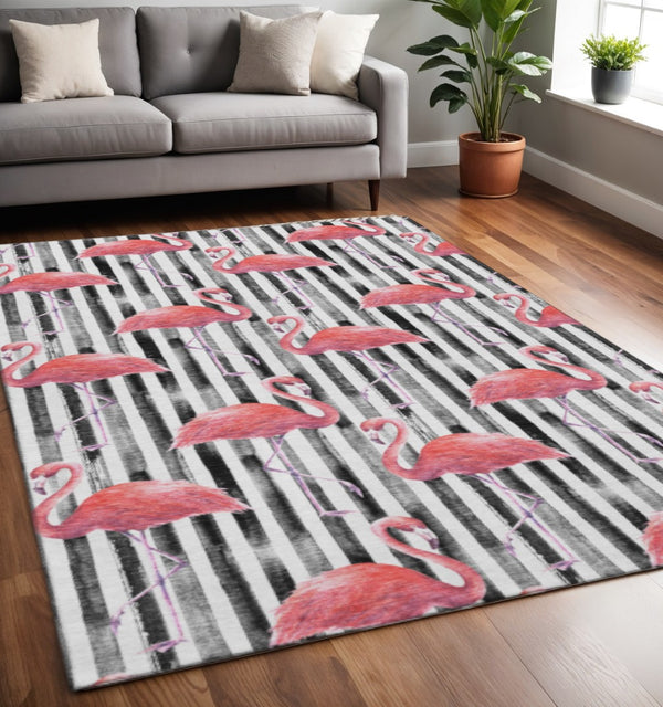 HomeRoots 5' X 8' Pink Black And White Geometric Area Rug - Washable, UV-Protected, Durable for Homes & Patios 646357