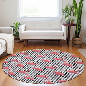 HomeRoots 8' Pink Black and White Geometric Round Rug - Stylish, Washable, UV-Protected for Modern Spaces 646358