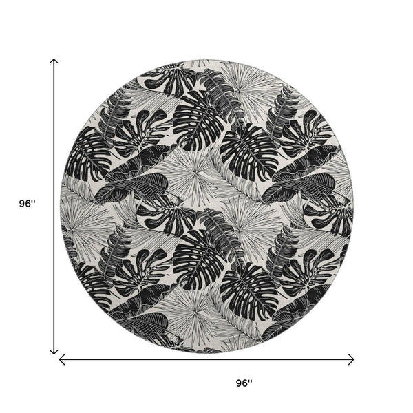 HomeRoots 8' Midnight and Ivory Geometric Round Rug - Washable, UV-Protected, Ideal for High-Traffic Areas! 646400
