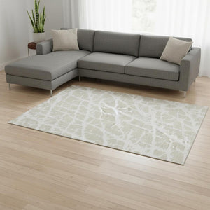HomeRoots 8' X 10' Beige and Ivory Abstract Area Rug - Washable, UV Protected, Stylish for High-Traffic Spaces 646516