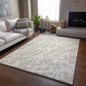 HomeRoots 8' X 10' Beige and Ivory Abstract Area Rug - Washable, UV Protected, Stylish for High-Traffic Spaces 646516