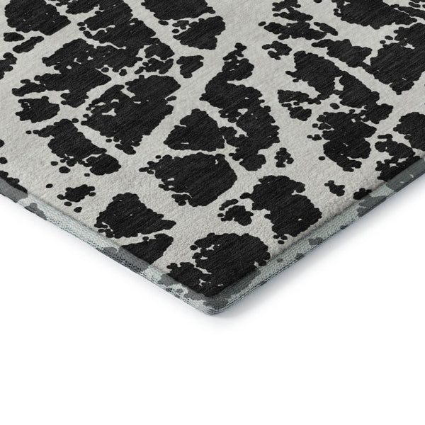 HomeRoots 5' X 8' Black And Ivory Abstract Area Rug - Washable, UV Protected, Stylish & Durable for Families 646520