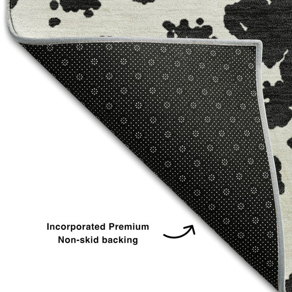 HomeRoots 8' Black And Ivory Abstract Washable Round Rug - Stylish, Durable & UV-Protected for Busy Homes! 646521