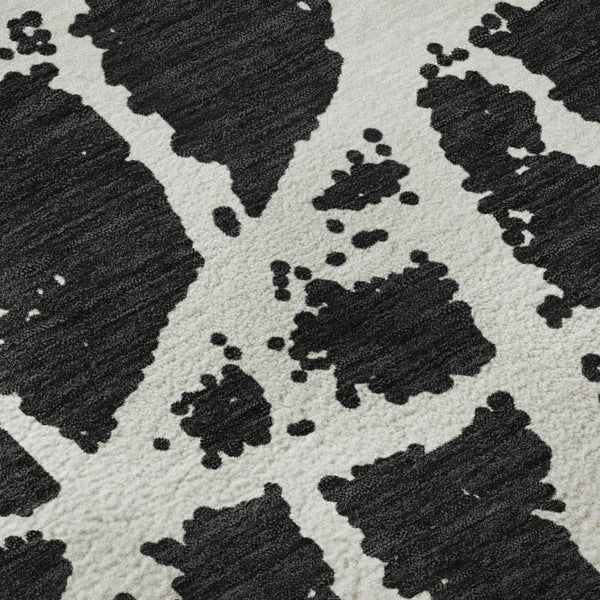 HomeRoots 8' Black And Ivory Abstract Washable Round Rug - Stylish, Durable & UV-Protected for Busy Homes! 646521