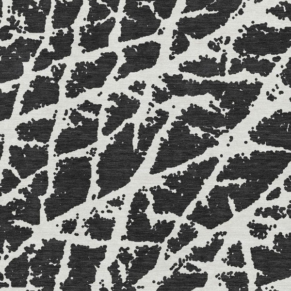 HomeRoots 8' X 10' Modern Black and Ivory Abstract Washable Area Rug with UV Protection for High-Traffic Homes 646522