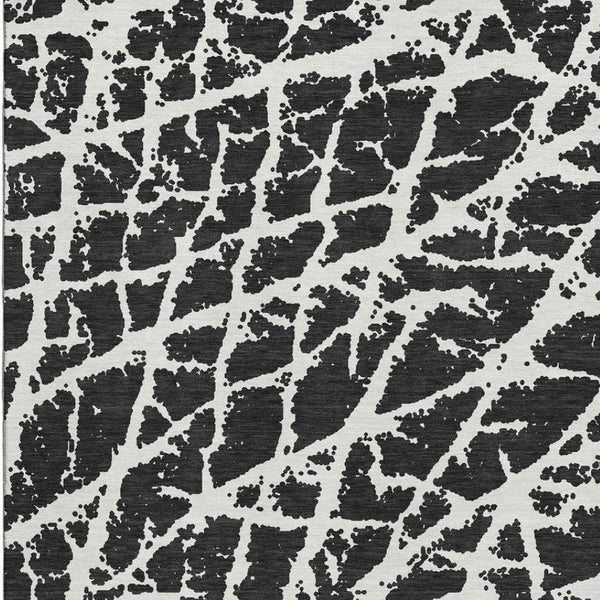 HomeRoots 8' X 10' Modern Black and Ivory Abstract Washable Area Rug with UV Protection for High-Traffic Homes 646522