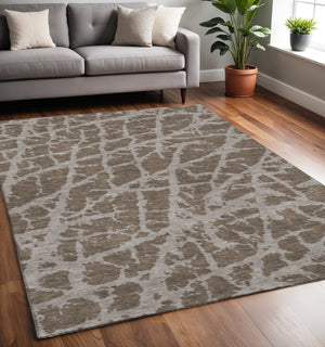 HomeRoots 5' X 8' Brown And Ivory Abstract Washable Area Rug - Durable, UV-Protected, Stain-Resistant Design 646526