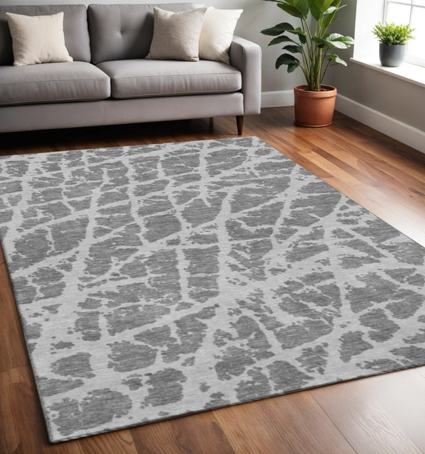 HomeRoots 5' X 8' Charcoal Ivory Abstract Area Rug - Washable, UV-Protected, Stain-Resistant & Stylish Comfort 646532