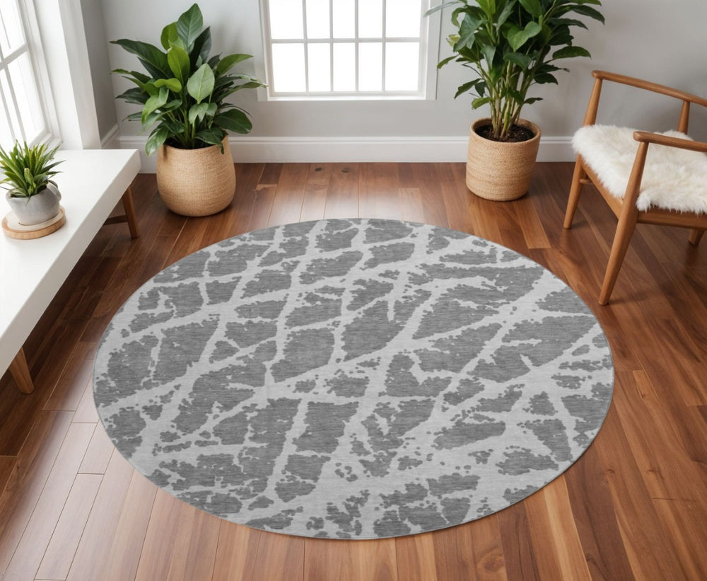 HomeRoots 8' Charcoal and Ivory Abstract Round Rug – Washable, Stain Resistant, UV Protected for Active Homes 646533