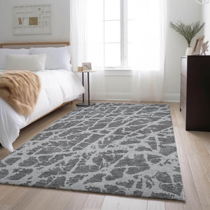 HomeRoots 8' X 10' Charcoal and Ivory Abstract Area Rug - Washable, UV Protected, Stylish for High-Traffic Homes 646534
