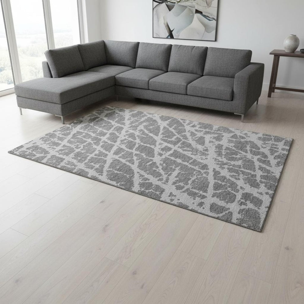 HomeRoots 9' X 12' Charcoal and Ivory Abstract Washable Area Rug - Stain Resistant, UV Protected, Durable Design 646535