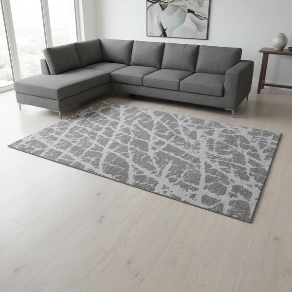 HomeRoots 9' X 12' Charcoal and Ivory Abstract Washable Area Rug - Stain Resistant, UV Protected, Durable Design 646535