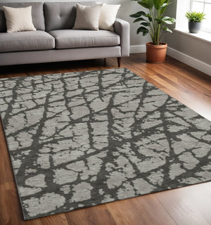 HomeRoots 5' X 8' Gray and Charcoal Abstract Area Rug - Soft, Washable, UV-Protected for Stylish High-Traffic Spaces 646544
