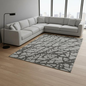 HomeRoots 9' X 12' Gray and Charcoal Abstract Area Rug - Washable, UV-Protected, Stylish & Durable Design 646547