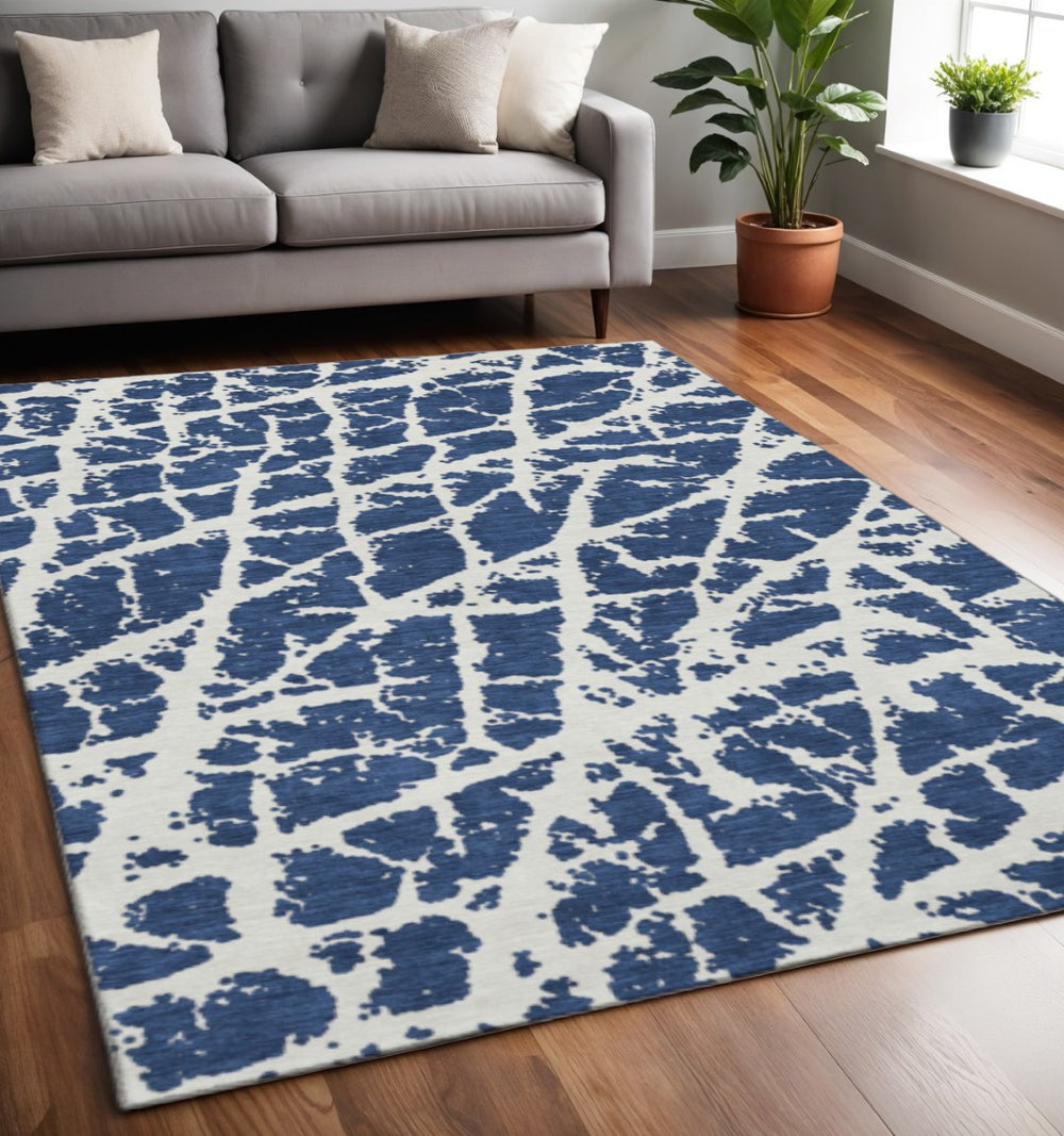 HomeRoots 5' X 8' Navy Blue & Ivory Abstract Area Rug – Washable, Stain-Resistant, UV Protected for Durability 646550