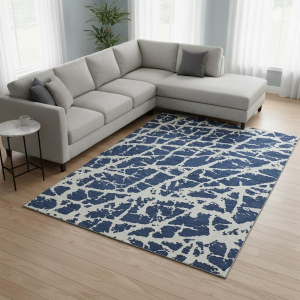 HomeRoots 9' X 12' Navy Blue Ivory Abstract Area Rug - Washable, UV Protected, Durable, and Stylish for Any Room 646553