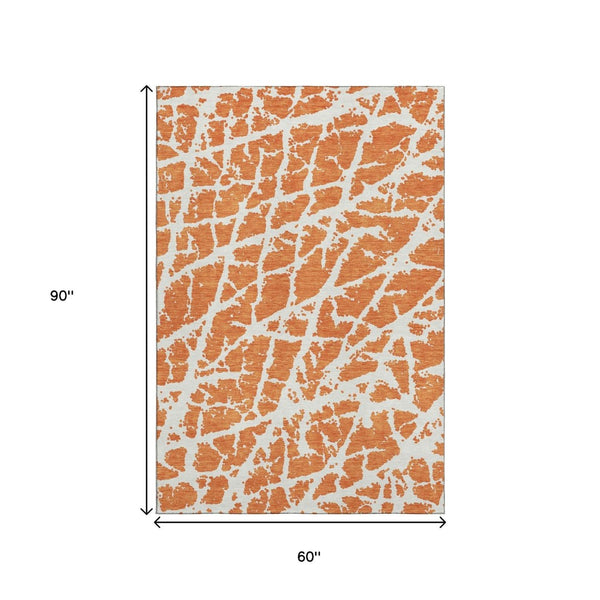 HomeRoots 5' X 8' Orange and Ivory Abstract Area Rug - Washable, UV Protected, Stain Resistant for Stylish Homes 646562
