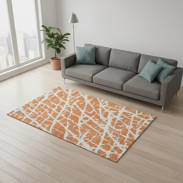HomeRoots 5' X 8' Orange and Ivory Abstract Area Rug - Washable, UV Protected, Stain Resistant for Stylish Homes 646562
