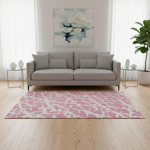 HomeRoots 5' X 8' Pink And Ivory Abstract Area Rug - Stylish, Washable, UV-Protected, and Stain-Resistant Decor! 646574