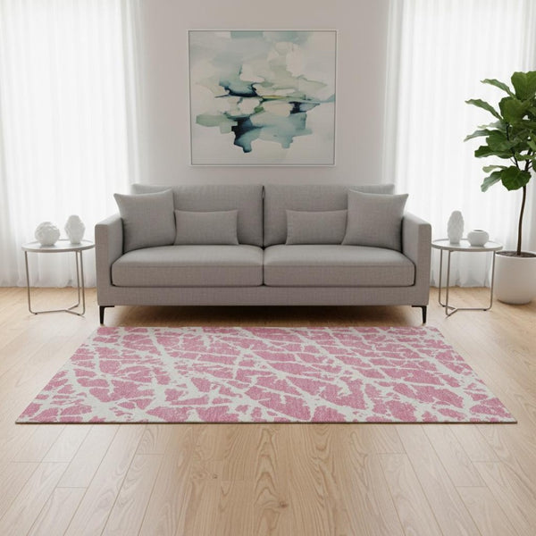 HomeRoots 5' X 8' Pink And Ivory Abstract Area Rug - Stylish, Washable, UV-Protected, and Stain-Resistant Decor! 646574