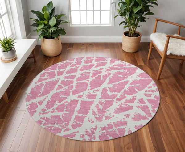HomeRoots 8' Pink And Ivory Abstract Washable Round Rug - Durable, Stain-Resistant, UV-Protected and Stylish! 646575