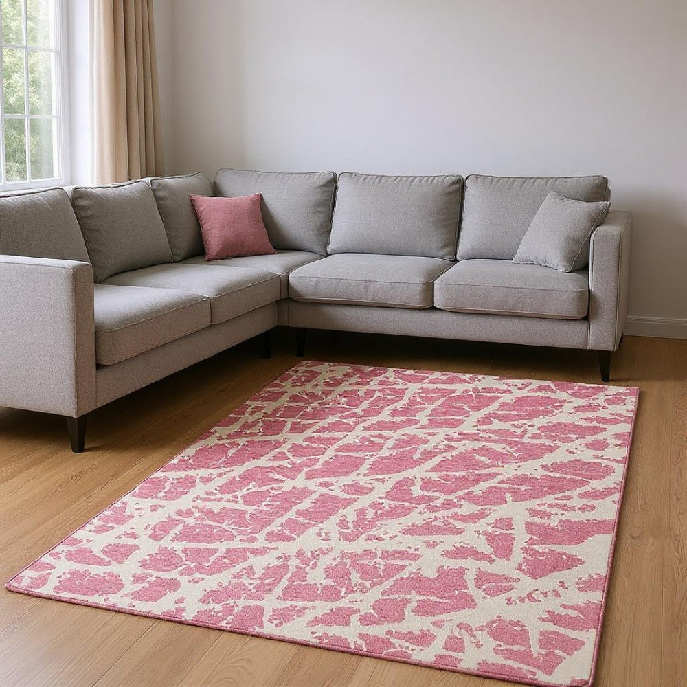 HomeRoots 10' Pink and Ivory Abstract Area Rug – Washable, UV-Protected, Stain-Resistant for Modern Spaces 646578