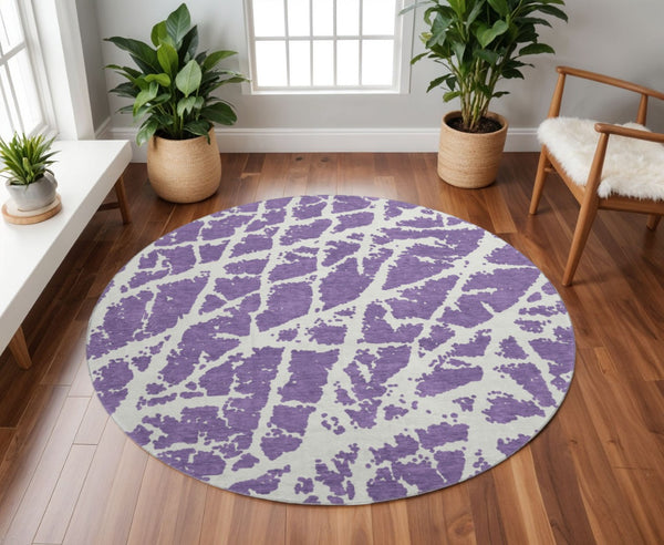 HomeRoots 8' Purple and Ivory Abstract Washable Round Rug – Durable, Stain-Resistant, UV Protected Design! 646581