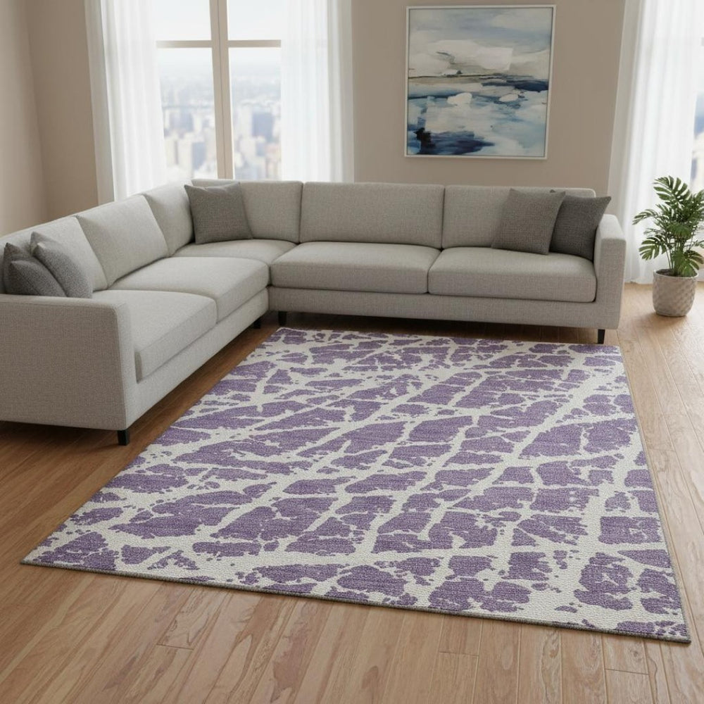 HomeRoots 9' X 12' Purple and Ivory Abstract Area Rug - Stylish, Washable, UV-Protected for Modern Homes 646583
