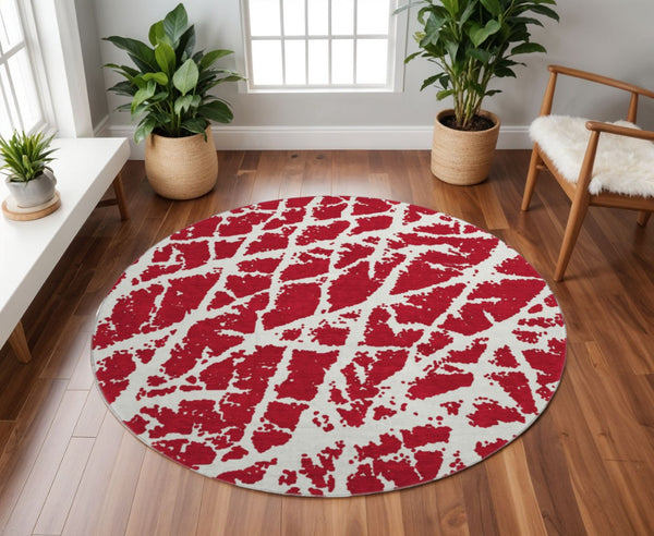 HomeRoots 8' Bold Red And Ivory Abstract Washable Round Rug With UV Protection For Modern Family Spaces 646587