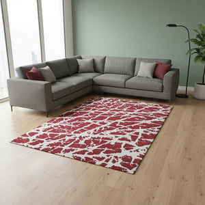 HomeRoots 8' x 10' Red and Ivory Abstract Washable Area Rug - UV Protected, Stain Resistant, Modern Style! 646588