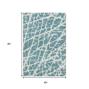 HomeRoots 5' X 8' Teal and Ivory Abstract Area Rug – Durable, Washable, UV-Protective for Modern Spaces 646592