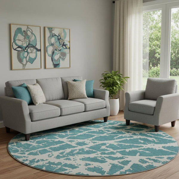 HomeRoots 8' Teal and Ivory Abstract Washable Round Rug - Durable, Stain-Resistant, UV-Protected Comfort for Your Home 646593