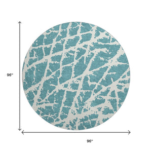 HomeRoots 8' Teal and Ivory Abstract Washable Round Rug - Durable, Stain-Resistant, UV-Protected Comfort for Your Home 646593