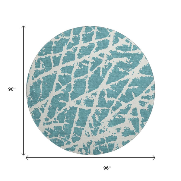 HomeRoots 8' Teal and Ivory Abstract Washable Round Rug - Durable, Stain-Resistant, UV-Protected Comfort for Your Home 646593