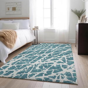 HomeRoots 10' Teal and Ivory Abstract Area Rug – Durable, Washable, UV Protected for Modern Homes with Pets! 646596