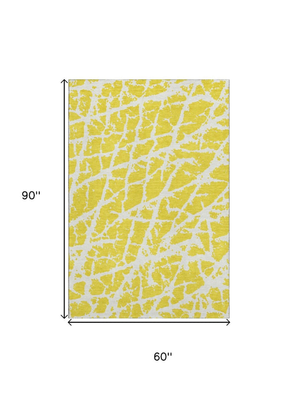 HomeRoots 5' X 8' Washable Yellow & Ivory Abstract Area Rug with UV Protection – Durable, Stylish, Pet-Friendly! 646598