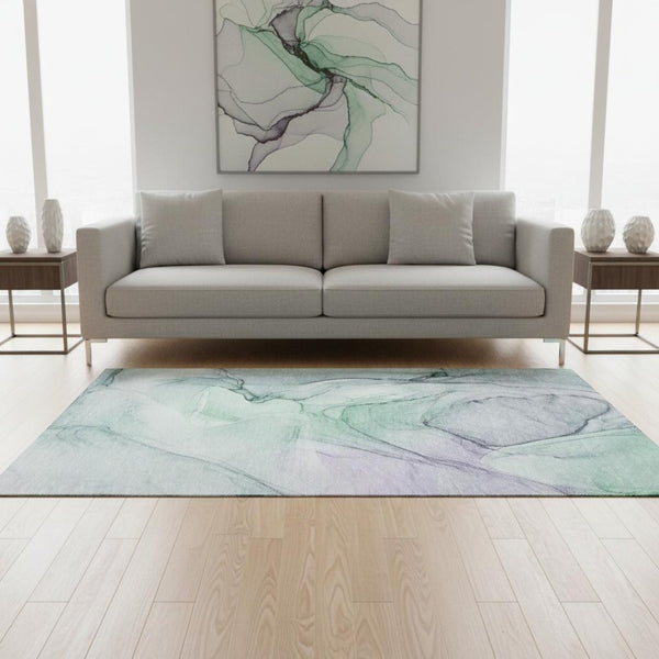 HomeRoots 5' X 8' Blue & Green Abstract Washable Area Rug - Stylish, Durable, UV-Protected for High-Traffic Rooms 646610