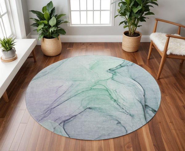 HomeRoots 8' Blue and Green Abstract Washable Round Rug - UV-Protected, Stain-Resistant, Ideal for High-Traffic Areas 646611