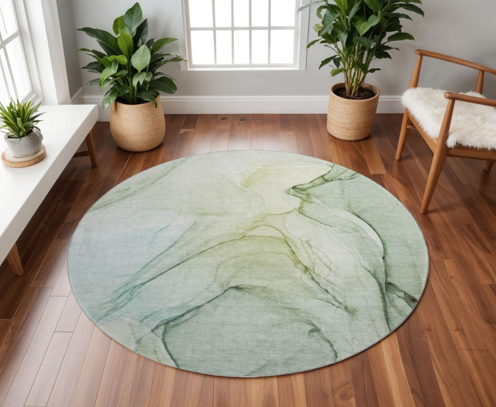 HomeRoots 8' Green and Ivory Abstract Washable Round Rug - Durable, UV-Protected, Stylish for Indoor & Outdoor Use 646629