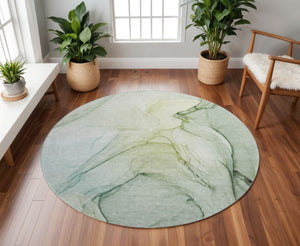 HomeRoots 8' Green and Ivory Abstract Washable Round Rug - Durable, UV-Protected, Stylish for Indoor & Outdoor Use 646629
