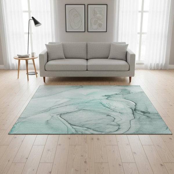 HomeRoots 5' X 8' Teal and Ivory Abstract Area Rug - Durable, Washable, UV Protected for Modern Living Spaces 646652