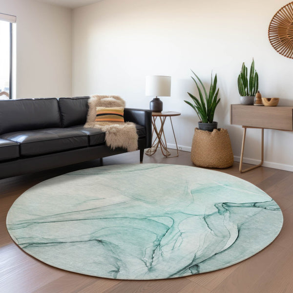 HomeRoots 8' Teal and Ivory Abstract Round Rug - Washable, UV Protected, and Perfect for Busy Homes! 646653