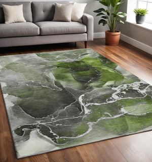 HomeRoots 5' X 8' Green and Charcoal Abstract Washable Area Rug with UV Protection for Modern Spaces 646676