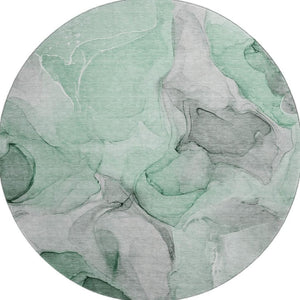HomeRoots 8' Stylish Green Gray and Ivory Abstract Round Rug - Washable, UV-Protected, Family-Friendly Design! 646719