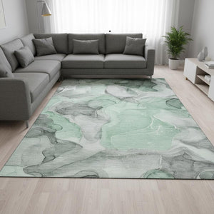 HomeRoots 9' X 12' Abstract Washable Area Rug in Green, Gray & Ivory - UV Protected, Stain Resistant Design 646721