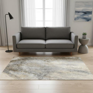 HomeRoots 5' X 8' Stylish Beige and Ivory Abstract Area Rug - Washable, UV Protected, Stain-Resistant Design! 646764